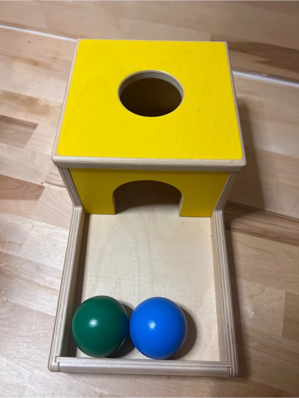 Lovevery Yellow Wooden Ball Drop Toy with Blue & Green Balls